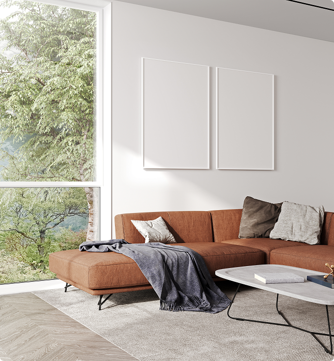 Modern living room with orange sofa and large windows